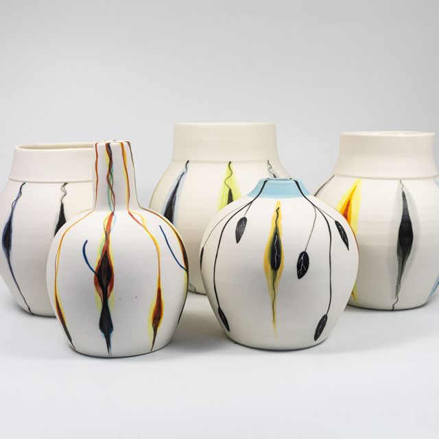 Porcelain 'Tulips' vases; glazed internally; approx 12 x 10 cm