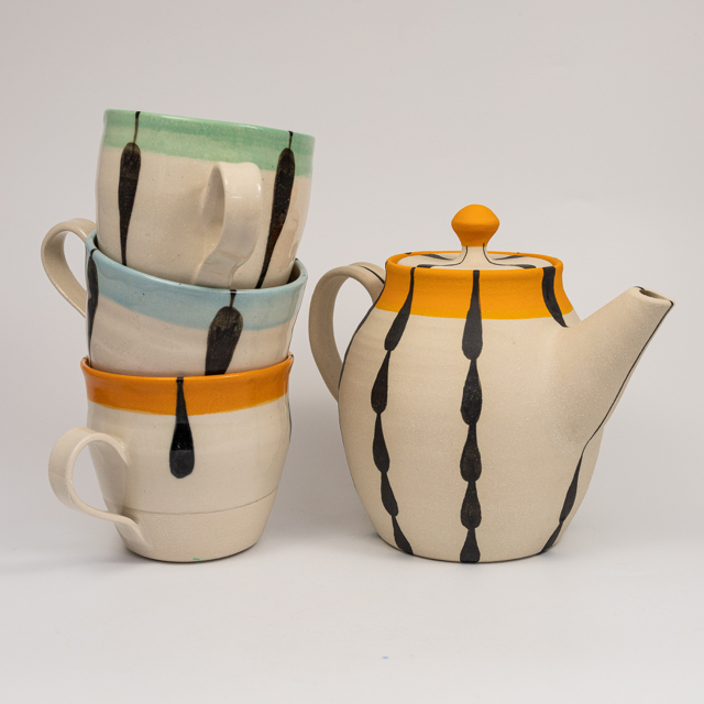Stoneware 'Foliage' teapot and cups, all glazed internally; teapot 15.5 x 18 cm
